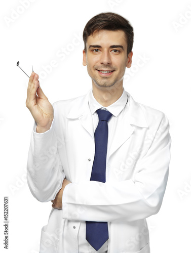 Handsome young dentist with...
