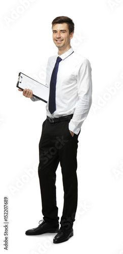 Handsome young man with clipboard on white background