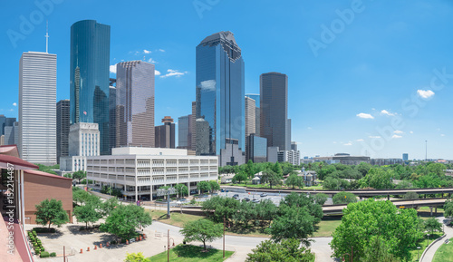 Panorama aerial view downtown Houston next to I-45 freeway during daytime, cloud blue sky. The most populous city in Texas and the fourth-most in United States. Transportation, architecture background © trongnguyen
