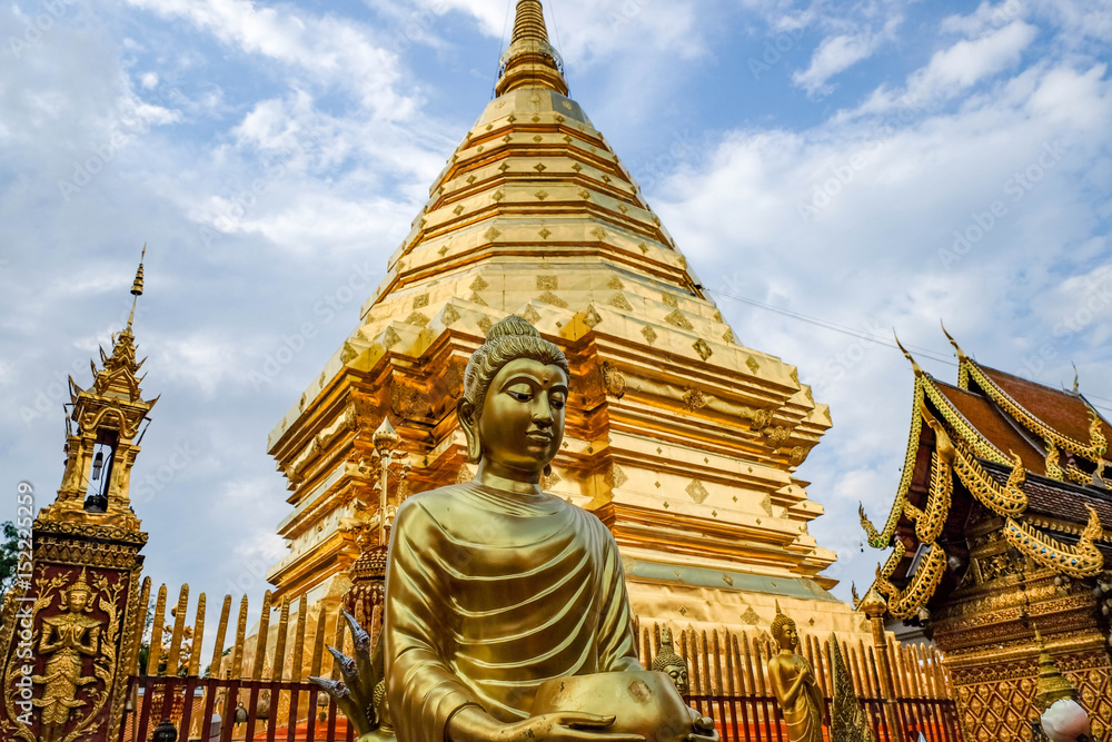Fototapeta premium Golden Buddha statue in Wat Phra That Doi Suthep is tourist attraction of Chiang Mai, Thailand.Asia.