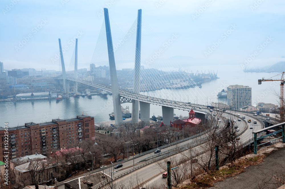Fototapeta premium Russia, Vladivostok, April 8: Bridge over Golden Horn Bay