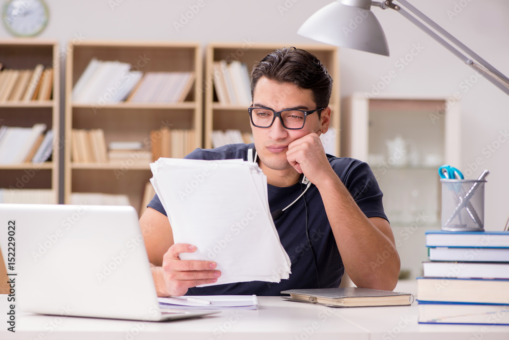 Angry man with too much paperwork to do Angry man with too much paperwork to do