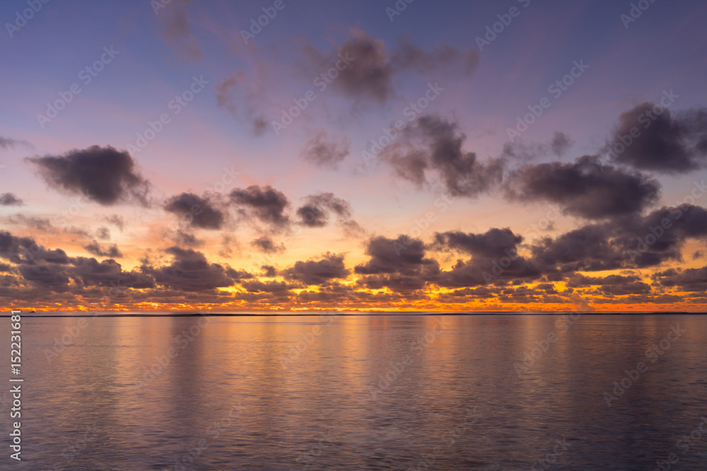 Colorful sunrise over tropical ocean