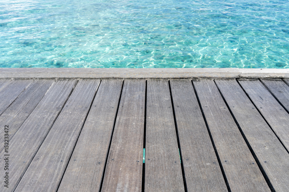 Wooden floor with seascape background Wooden floor with seascape background