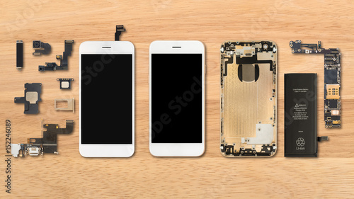 Принти на полотні Flat Lay (Top view) of smartphone components on wooden background