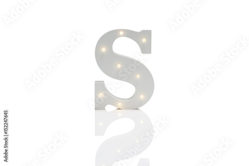 Fototapeta Naklejka Na Ścianę i Meble -  Decorative Letter S with Embedded LED Lights Over White Background