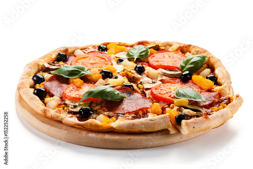 Pizza pepperoni with tomatoes, mushrooms and olives