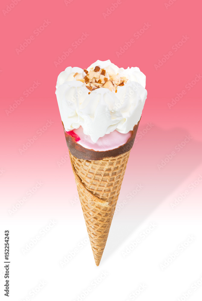 Strawberry ice cream cone with cream and almond stuffed with strawberry jam isolated on pink and white background (clipping path included) Strawberry ice cream cone with cream and almond stuffed with strawberry jam isolated on pink and white background (clipping path included)