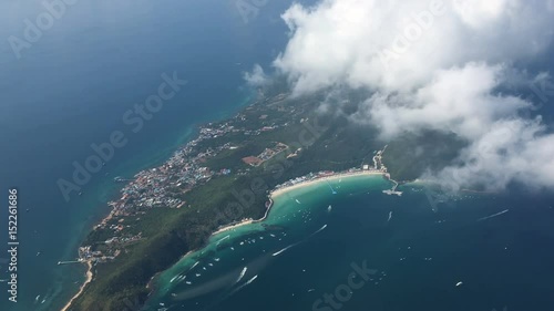 aerial view from propeller aircraft  over blue sea and islands of Koh Lan, Pattaya, Thailand