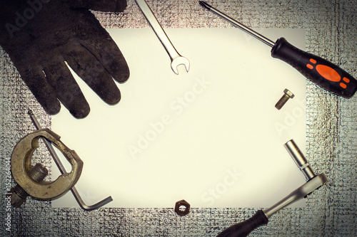 Tools screwdriver, puller, bolt, nut, glove