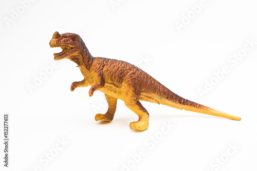 Dinosaur toy plastic figures on white background © niphon