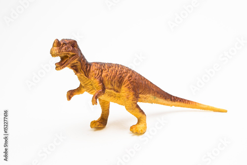 Dinosaur toy plastic figures on white background