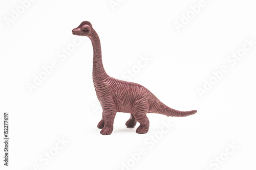 Dinosaur toy plastic figures on white background