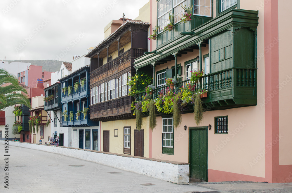 Famous ancient colorful balconies decorated with flowers in Santa Cruz de La Palma.