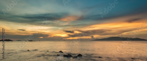 A view of Nha Trang bay just after sunrise with a beautiful colourful skyline.