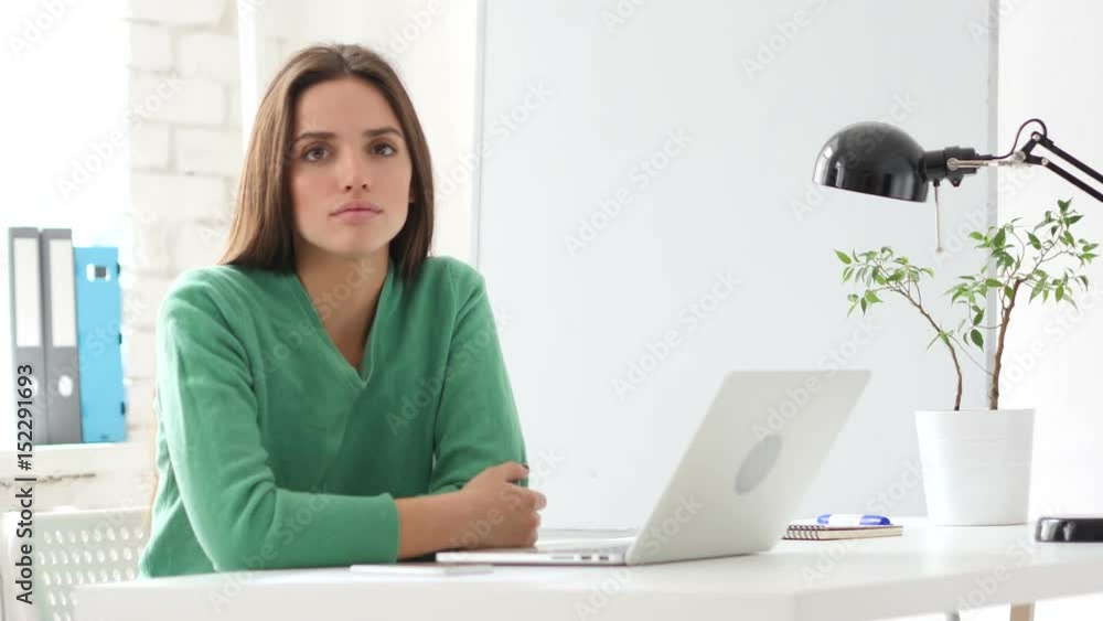 Creative Woman Looking at Camera at Work Creative Woman Looking at Camera at Work
