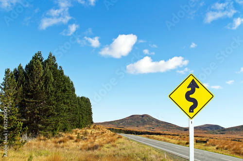 Empty road and traffic sign in landscape view