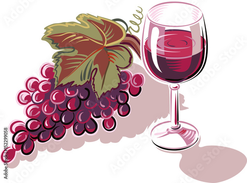bunch of grapes ripe freshly picked and a glass of wine.
