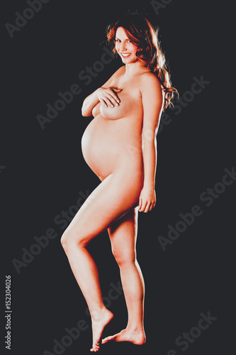 Side view of naked pregnant woman © agnieszka_marcinska