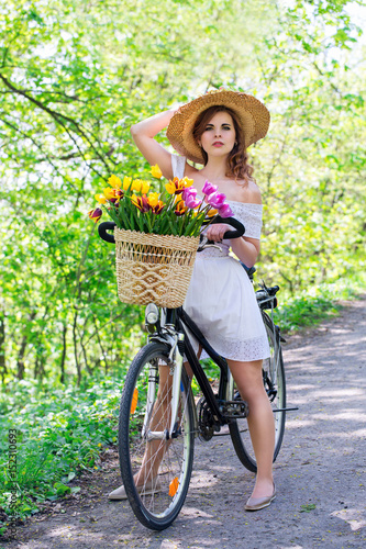 Beautiful woman riding a bicycle