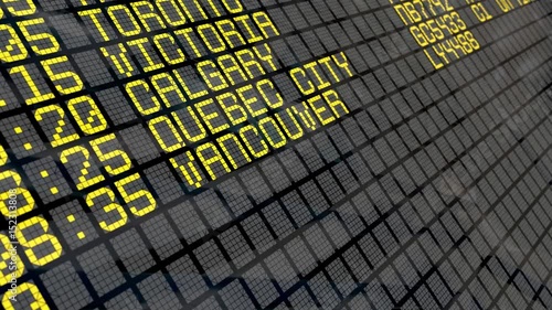 Close-up of an airport departure board to Canadian cities destinations, with environment reflection. Part of a series. 4k video resolution (4096x2304).
