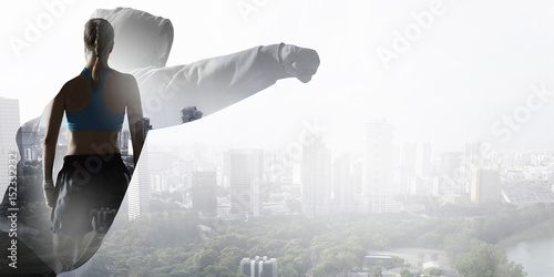 She is fighting for success . Mixed media