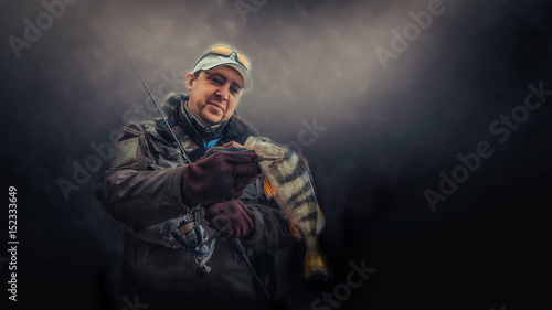 Fotografia Fishing. Happy angler with fish.