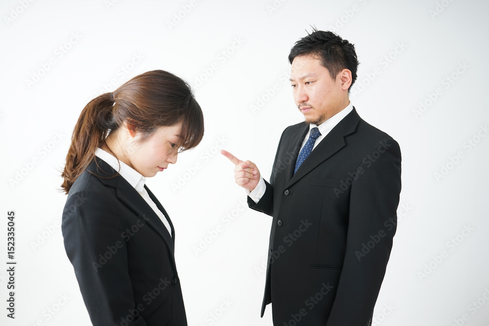 Boss angry with young business person Boss angry with young business person