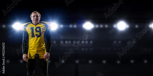 Football player at stadium. Mixed media © Sergey Nivens