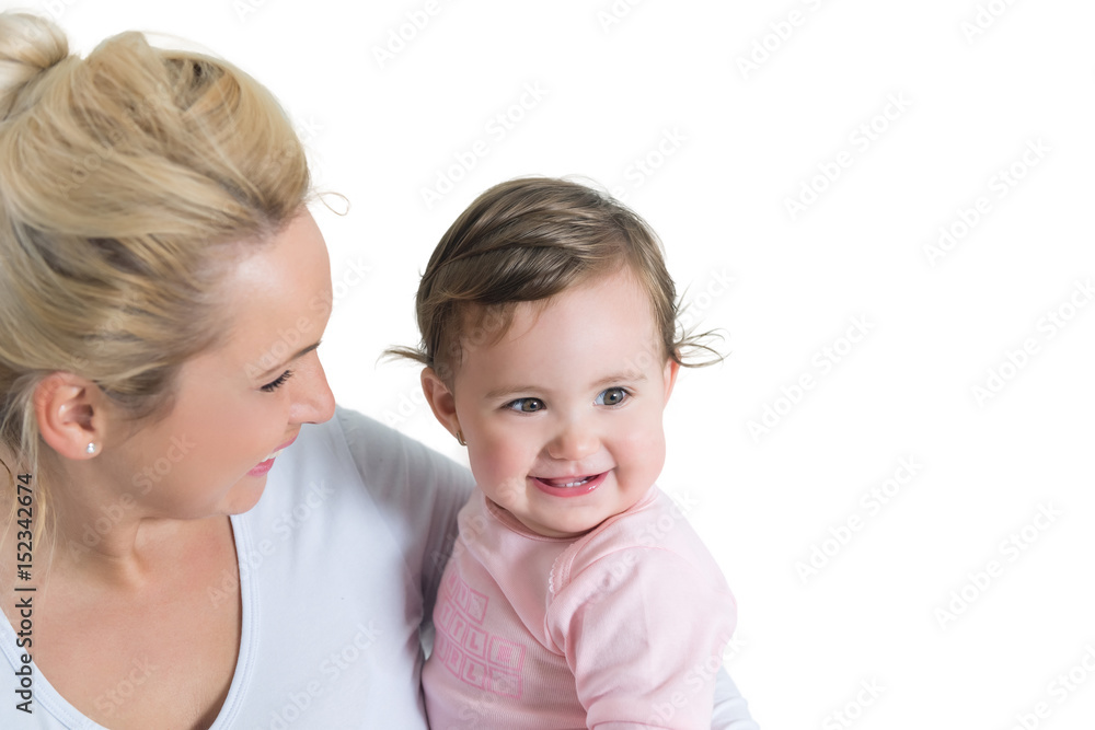 Portrait of embracing mom and baby little girl.Copy space. shallow doff, isolated on white Portrait of embracing mom and baby little girl.Copy space. shallow doff, isolated on white
