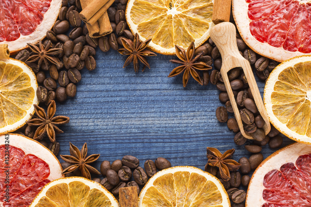 citrus slices and spices on wooden background citrus slices and spices on wooden background