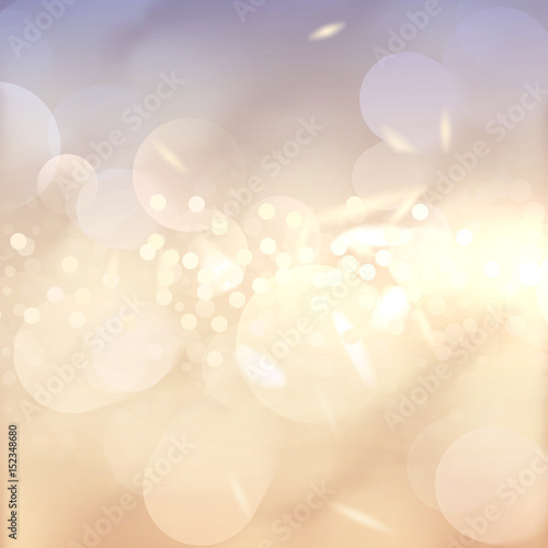 Bokeh effect background. Many lights. Abstract Golden Bright backdrop. Blurred defocused sparkles. Glow design. Lens Flare tender wallpaper. Highlight beam. Glare, Blur, flicker and glow.