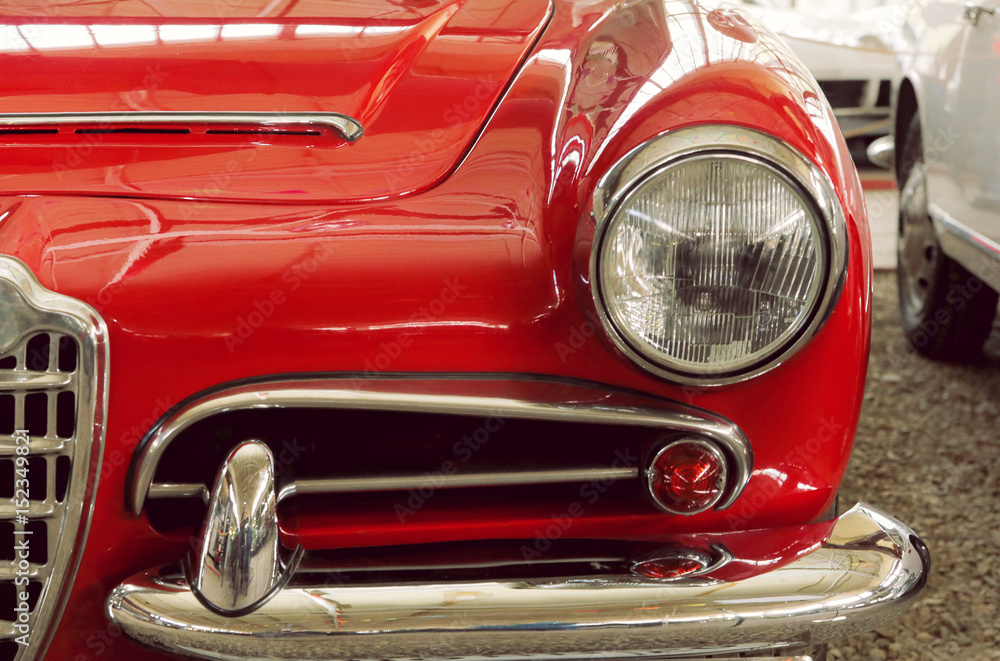 Color detail on the headlight of a vintage car