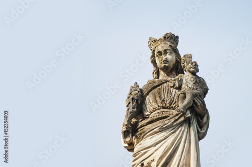 Broken ancient statue Of Virgin Mary and Jesus Christ