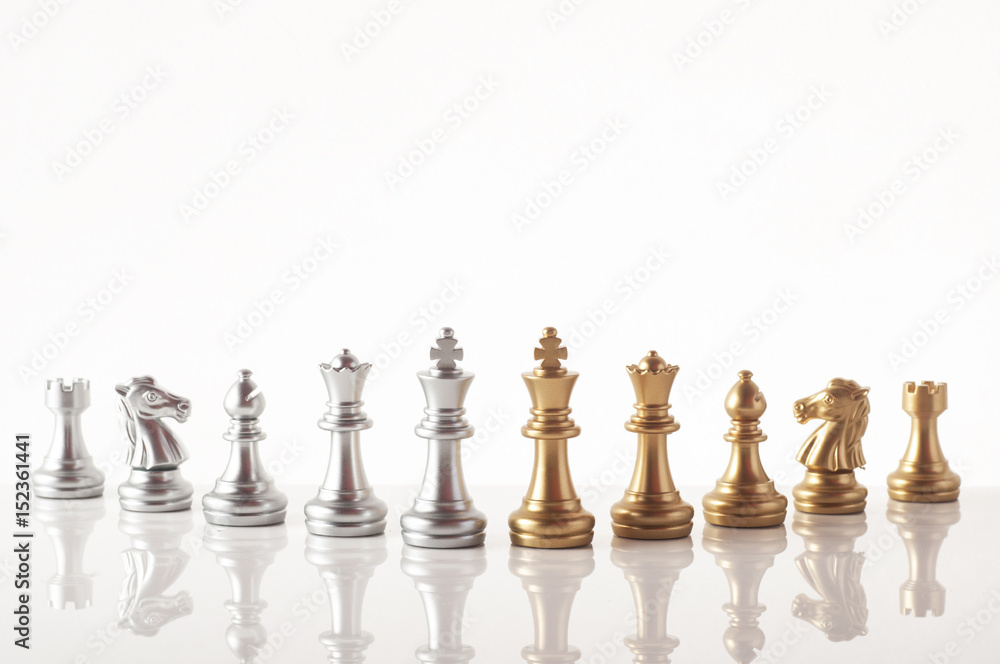  Silver and gold chess on white background.