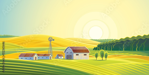 Rural landscape with fields and hills and with a farm.