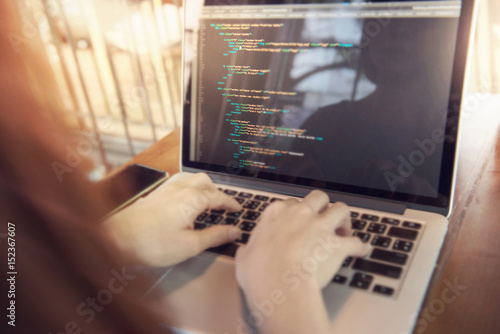 Woman hands coding html and programming on screen laptop, development web, developer.