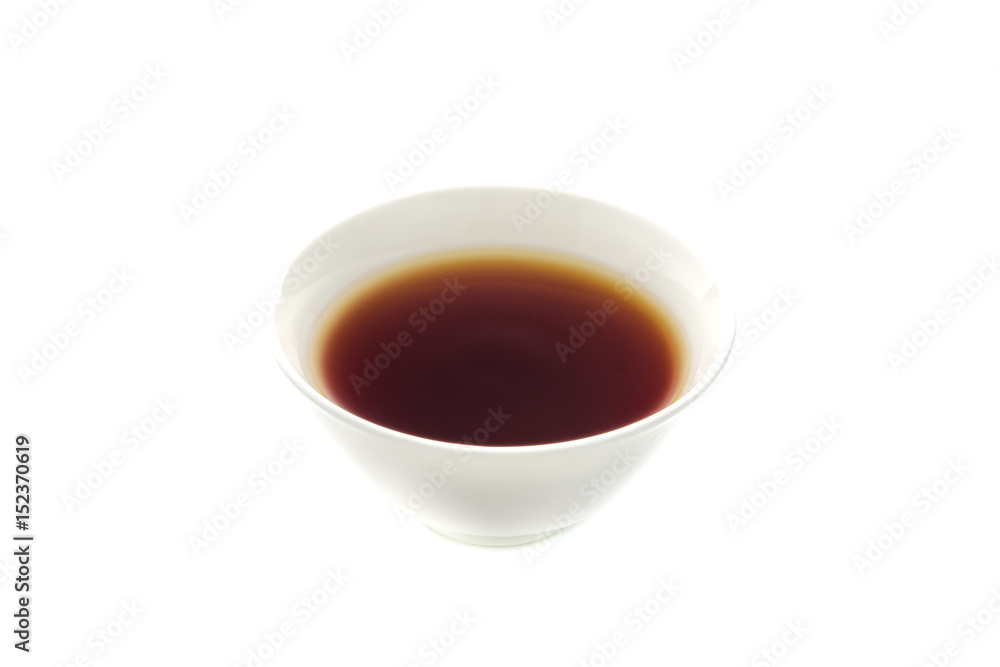 Light soy sauce in bowl isolated on white Light soy sauce in bowl isolated on white
