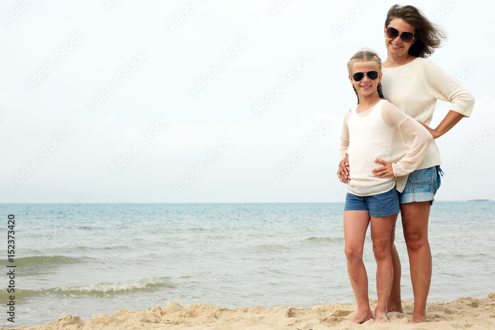 Parent and child happily spend time together. The concept of summer family vacation Parent and child happily spend time together. The concept of summer family vacation
