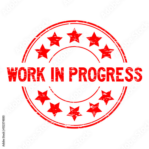 Grunge red work in process with star icon round rubber seal stamp on white background
