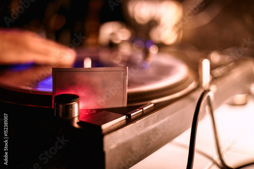 disc jockeys playing in mixing music on turntables and vinyl records