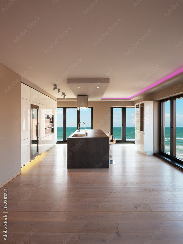 Interiors of a modern apartment, kitchen with sea view Interiors of a modern apartment, kitchen with sea view