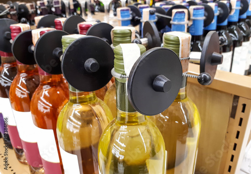 Fotografie RFID hard tag isolated - Shoplifting and anti-theft system - Electronic Article