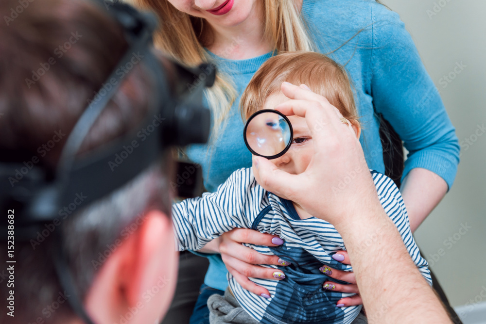 Indirect ophthalmoscope. Retinal examination. Fundoscopy. Child vision