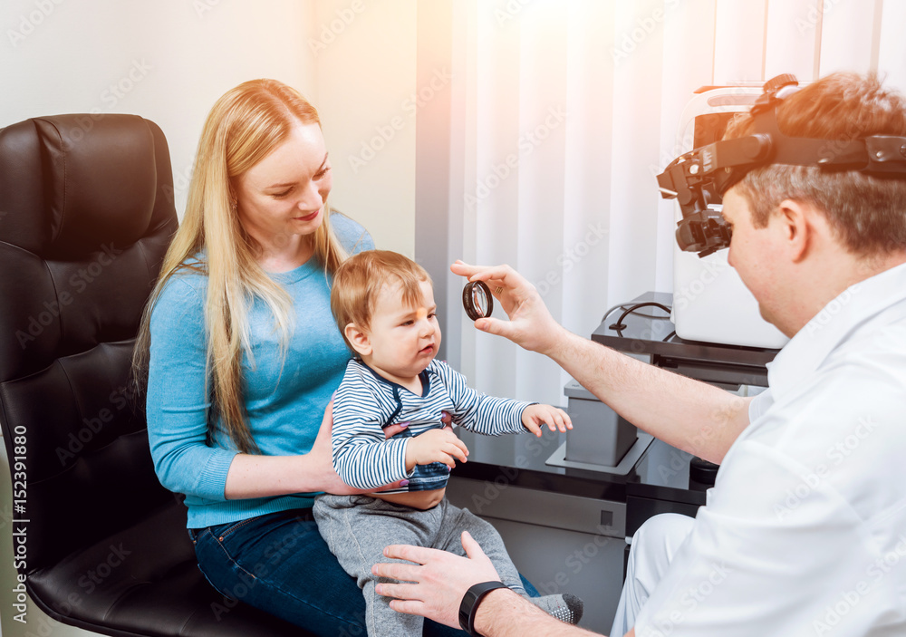 Indirect ophthalmoscope. Retinal examination. Fundoscopy. Child vision