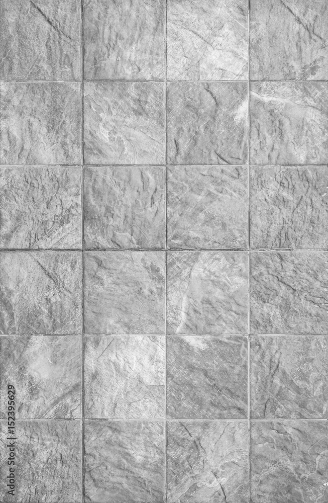 Fototapeta premium Closeup surface brick pattern at brick stone wall textured background in black and white tone