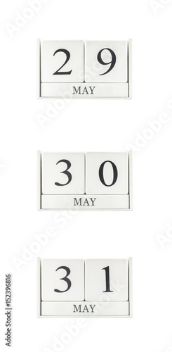 Closeup group of white wooden calendar with black 29 may , 30 may , 31 may word , three date calendar isolated on white background