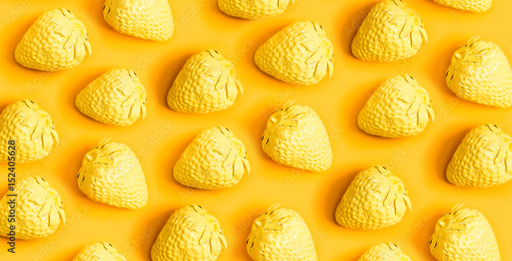 Yellow painted strawberries Yellow painted strawberries
