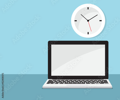laptop with clock background