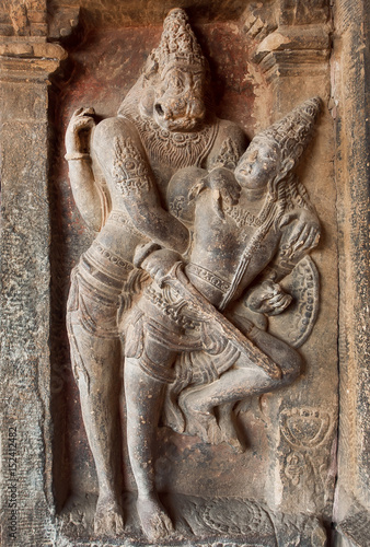 Hindu Lord Narasimha killing the evil. Indian rock-cut architecture of the 7th century temple, in town Pattadakal, India